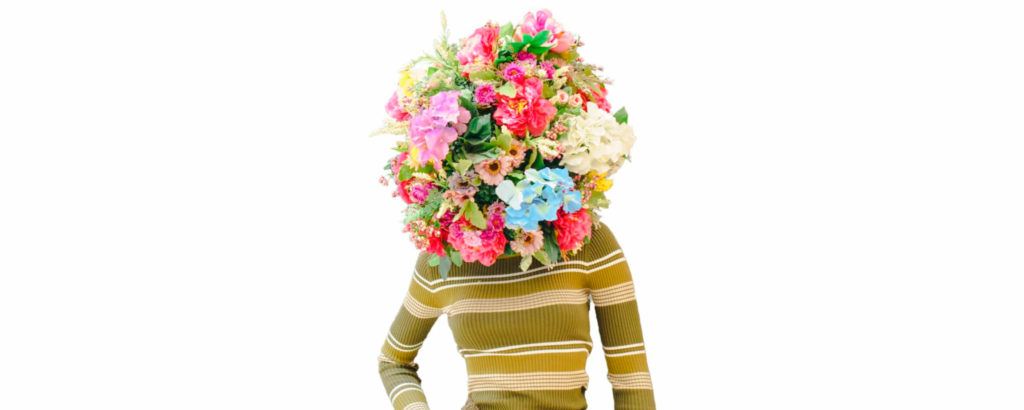 Woman with flowerhead